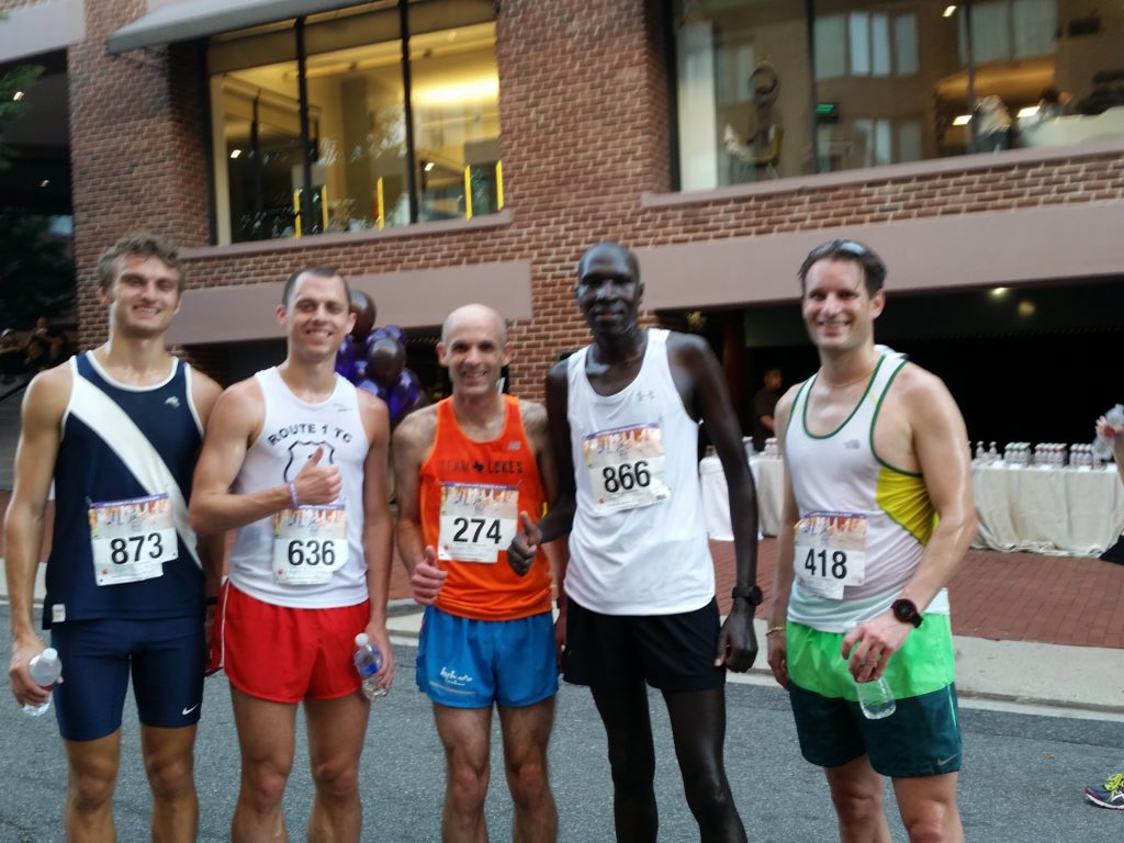 Joe Fisher with Wilson Komen and the top finishers at the 2017 Race to Beat Cancer