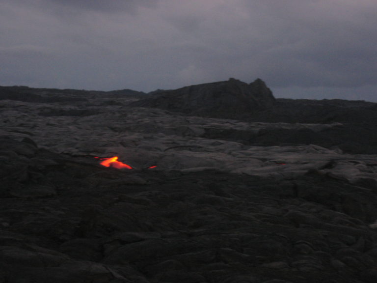 slow flowing red lava at night July 2005
