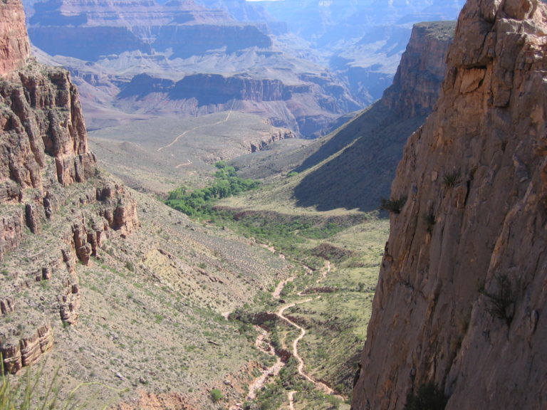 view of Bright Angel Trail from an elevated height with Indian Gardens and Plateau Point